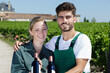 © auremar - a happy couple of workers in vineyard