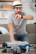 © auremar - man packing suitcase is running late