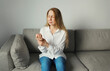 © rohappy - Unhealthy young woman suffers from wrist pain, tunnel syndrome, unwell girl touching her hand