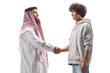 © Ljupco Smokovski - Saudi arab man and a young man shaking hands