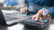 © Deemerwha studio - Businessman use laptop and calculator to finance management on financial analytics dashboard to accounting data analysis, growth chart report, portfolio performance and investment metrics.