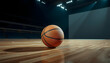 © byvea - A solitary basketball rests on the polished wooden court of a dimly lit arena, awaiting the start of an exhilarating game under the bright stadium lights