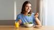 © Pixel Array - Smiling Woman Enjoying Healthy Breakfast of Salad and Toast
