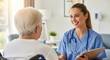 © twilight mist - Smiling healthcare professional communicates warmly with an older patient seated in a wheelchair