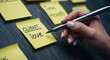 © The Little Hut - Hand writing client love note on sticky note for business marketing strategy and engagement planning
