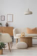 © Pixel-Shot - Interior of light living room with white sofa and lamp