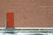 © a40757se - Red door on the brick wall