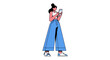 © mboku - Woman using smartphone standing in casual clothes.