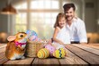 © BillionPhotos.com - easter coloring eggs and happy family on background
