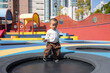 © leungchopan - Toddler baby boy having fun on trampoline outdoors
