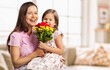 © BillionPhotos.com - Mother and daughter with a fresh bouquet of flowers