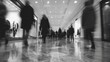 © Mike - Blurry Black and White Image of People Walking in a Modern Shopping Mall.