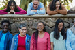 © Sabrina - Crowd of multiracial people with different age having fun together at city park - Social gathering, multi generational friends and community concept
