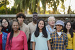 © Sabrina - Crowd of multiracial people with different age looking at camera outdoor - Social inclusion, community and support concept