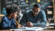 © Sabbir Dzns - A man helping a young boy with his schoolwork at a desk in a classroom