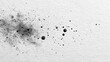 © DreamGrid - Abstract ink splatter on textured paper, a minimalist black and white design