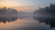© The 2R Artificiality - Calm water river landscape at dawn with misty fog and quiet tree reflections