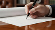 © A.M - Professional hand signing important document with pen on paper