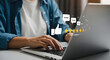 © Love - Person typing on laptop with satisfaction icons floating above keyboard
