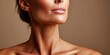 © NovaVision - Close-up of a woman's neck and jawline with soft lighting and subtle makeup