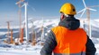 © Putra - Engineer in Protective Winter Clothing at Renewable Energy Site