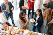 © Rawpixel.com - Lively social gathering with food.
