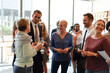 © Rawpixel.com - Casual business networking event attendees