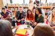 © Rawpixel.com - Diverse students studying in library.