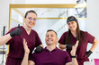 © Marko - Dentist office with staff showing support and engagement during a patient visit