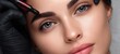 © Olha - The eyebrow microblading treatment on a close-up female face with perfect skin