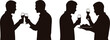 © Sadhin - Silhouettes of men toasting and sharing a meal together in a social setting