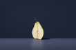 © ADDICTIVE STOCK - Lemon pear on a dark background