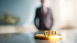 © A2Z AI  - Golden CFO Acronym with Illuminated Glow on Desk, Blurry Business Professional Figure in Background, Corporate Leadership Concept
