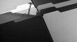 © Platon - An abstract, monochrome close-up of sleek, dark folder tabs with a glossy finish and sharp lines. High-contrast architectural look.