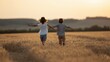 © Sipan - Siblings running through a golden wheat field at sunset laughing with arms outstretched in freedom.