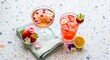 © Lucas - silhouette Mother's day celebration with rose petal drinks and strawberries on a terrazzo surface