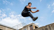 © Emanuel - Parkour Athlete Jumping Outdoors