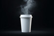 © Muner - Steaming hot white disposable coffee cup on dark background
