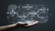 © Buy my stuff  - A hand holds a glowing digital content creation process with icons for ideas creation publish and distribution