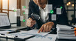 © MAHFUJ MONDOL - A business professional conducting a detailed document quality control check with a magnifying glass