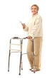© Pixel-Shot - Mature woman with walker using mobile phone on white background
