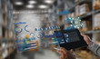 © onephoto - AI-powered business analytics dashboard above a tablet in a warehouse, displaying real-time inventory, logistics, supply chain metrics, data visualization, and automation insights.