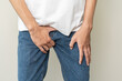 © Pormezz - men feeling itching and scratching his crotch