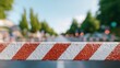 © Business Image - Städtische Straße mit Verkehrsbarriere, die eine Straßensperrung und neue Wege für die Stadtplanung anzeigt