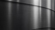 © Talia - Modern industrial background of brushed dark metallic surfaces with elegant curves and reflections.