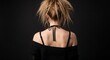 © Nailulhiya - Womans Back View - Messy Hair and Black Outfit.