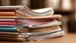© touseef - Stack of medical journals and research papers on a desk with organized scientific literature and healthcare publications for professional study and medical research