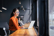 © Stock 4 You - Young professional it specialist latin hispanic business lady working on laptop pc sitting at desk in modern office space. 30s middle eastern indian woman using computer technology app for work online