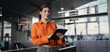 © Stock 4 You - Latin Hispanic adult professional business woman looking at online trade app. European businesswoman CEO holding digital tablet using fintech tab app at workplace in office. Web banner, copy space