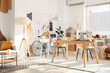 © Pixel-Shot - Interior of light fashion designer's studio with tables and pin board